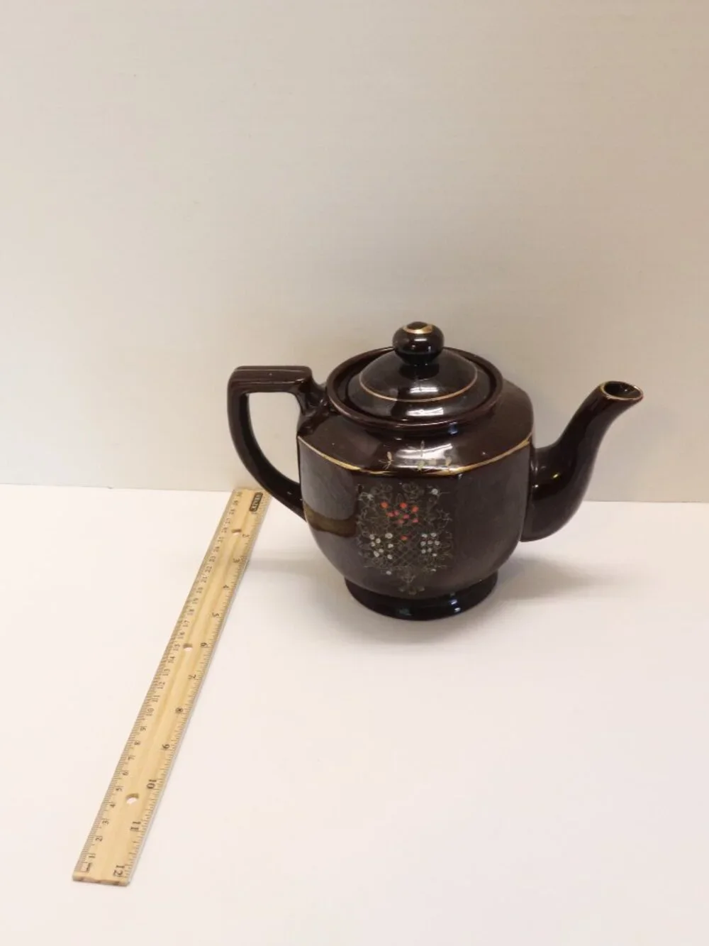 A Porcelain Pitcher made in Japan with Japan Written on Bottom Black